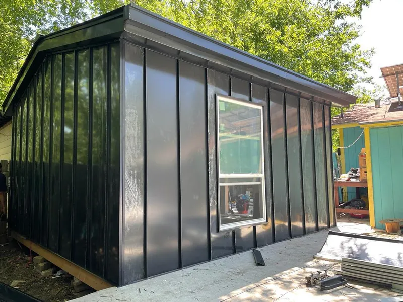 Black standing seam metal wall panels for Metal Roof Installation in Town 'n' Country