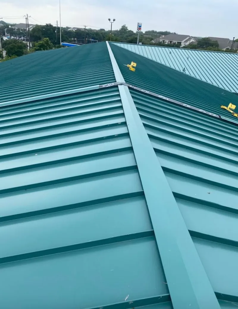 Green commercial metal roof ridge and valley for Metal Roof Repair in Town 'n' Country